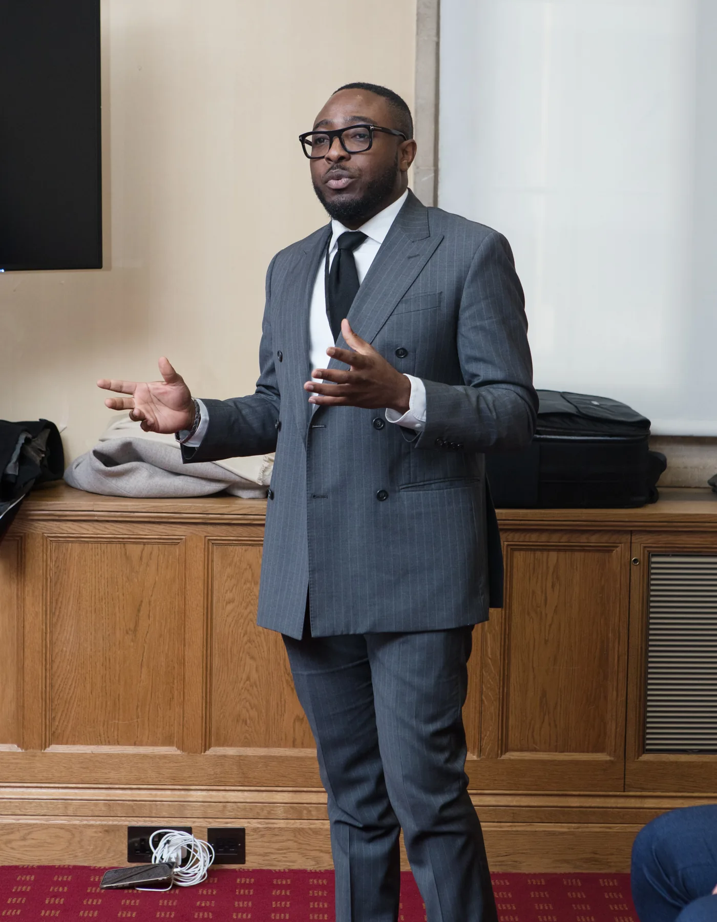 Dr Daniel Moses speaking at an educational event